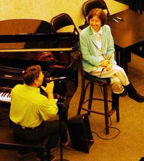 Carol de Giere and Stephen Schwartz speaking